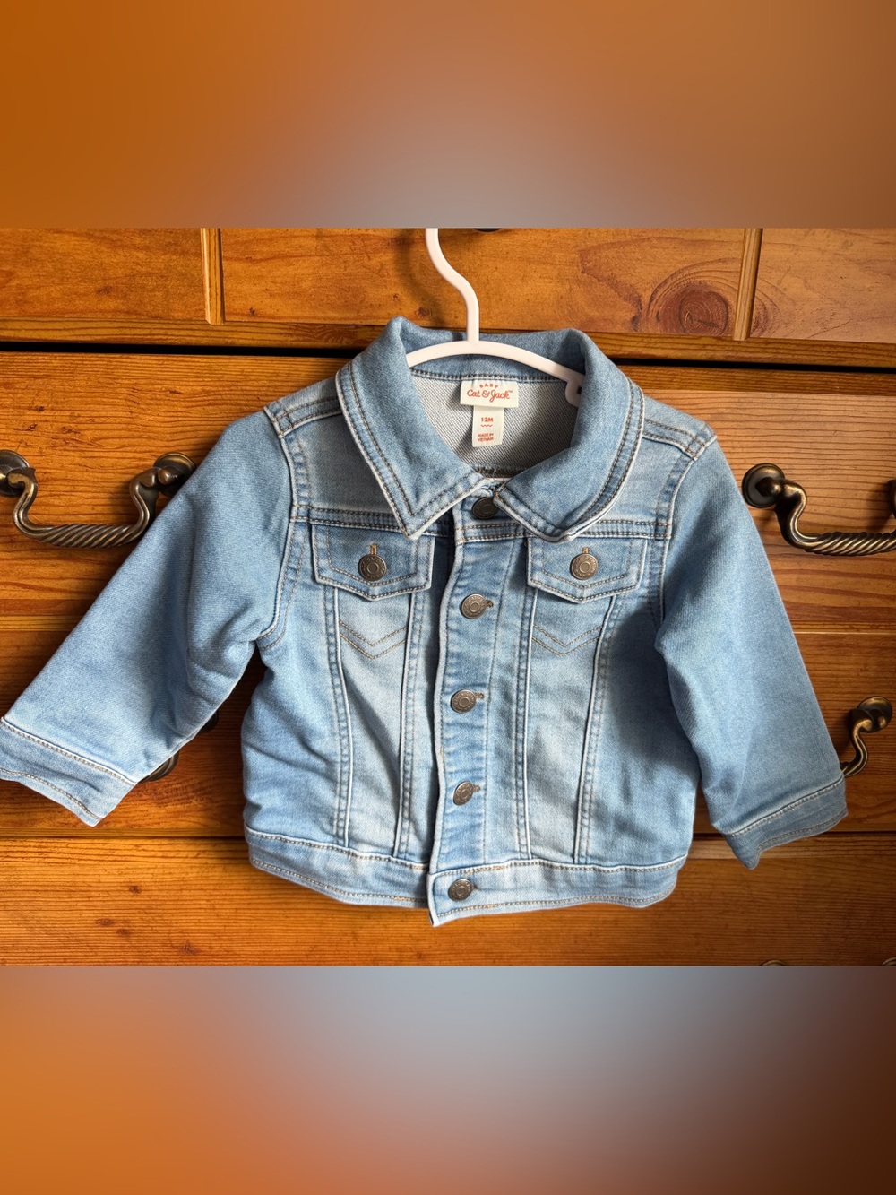 Like new cat & jack soft/stretchy jean jacket w/ floral patch on back 12m